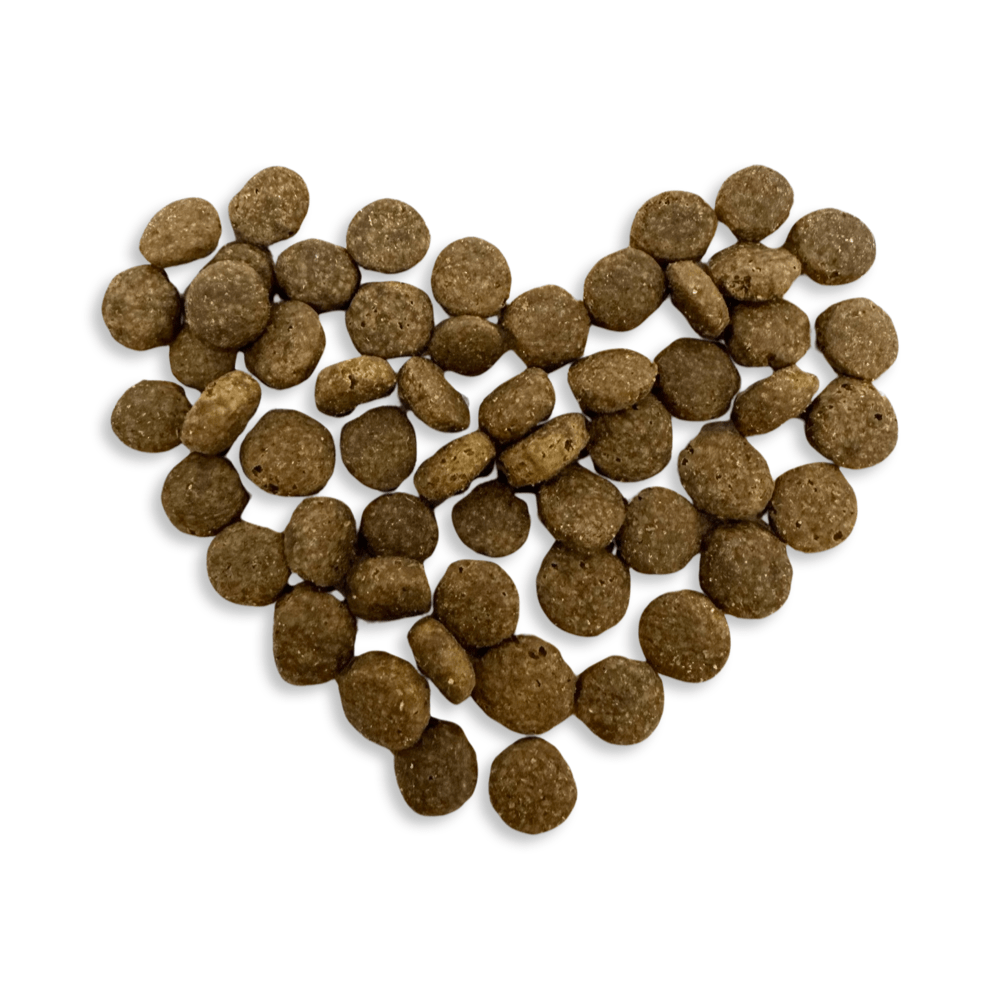 Huhn mit Reis Trockenfutter für Hunde von kallisbest in einer Verpackung mit Hundekroketten sichtbar.